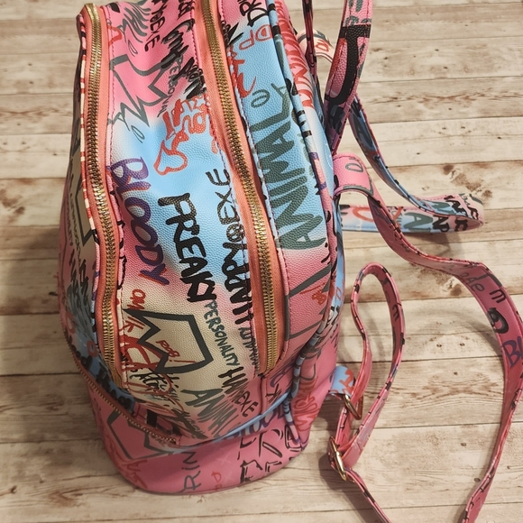 Graffiti Patterned Backpack - Picture 4 of 9